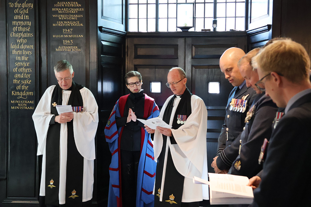 The Clergy read a prayer to the congregation.